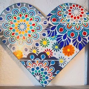 Hand painted wood Heart, very lightweight.  Approximately 13 inches in diameter.